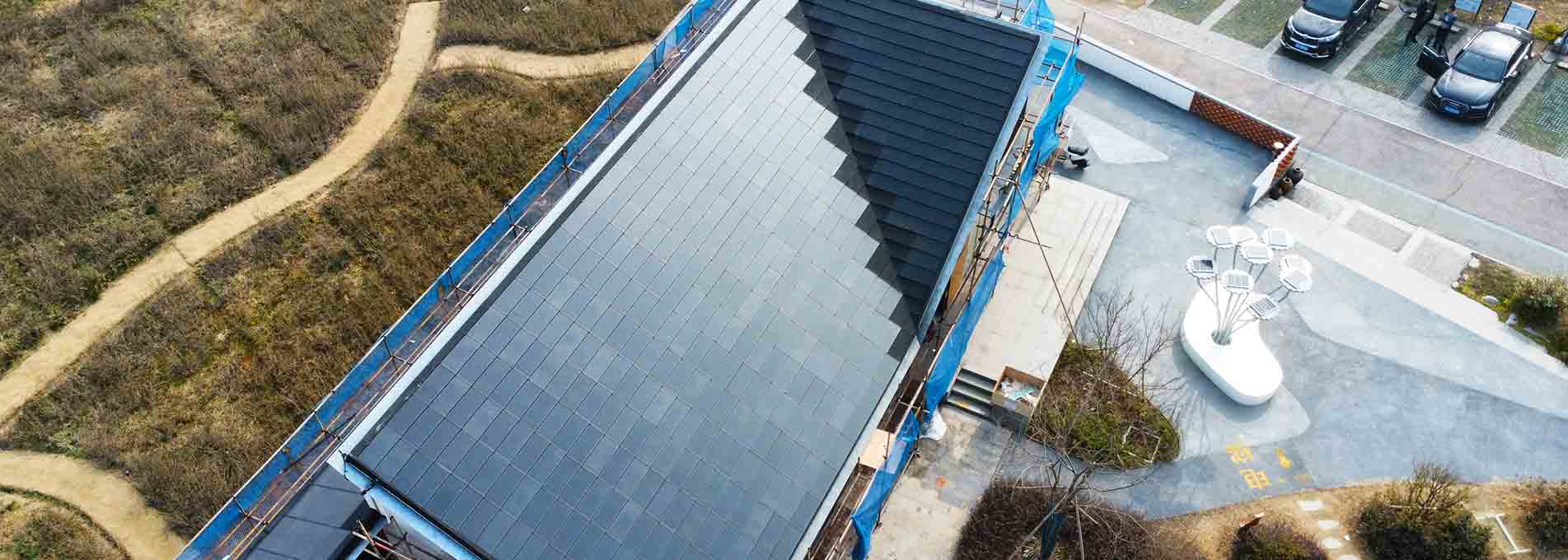Solar panel roof tiles